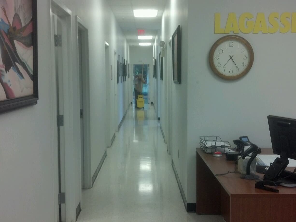 Walk-behind floor machine on a hard commercial floor